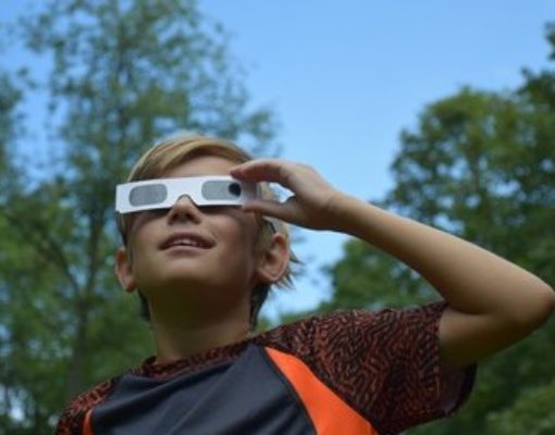 boy with solar glasses
